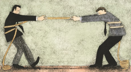 Two businessmen having a tug of war